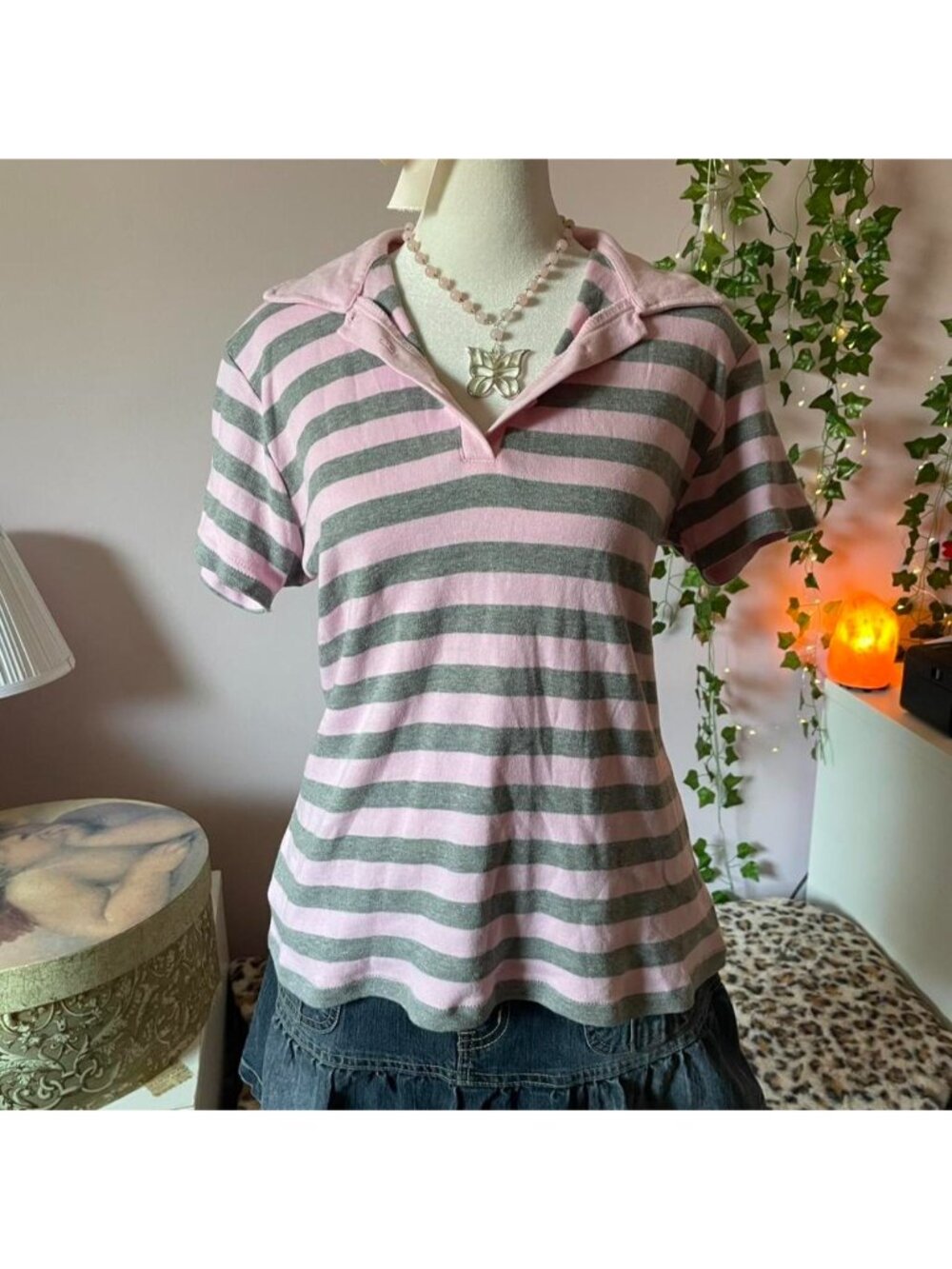 Pink and grey striped polo shirt